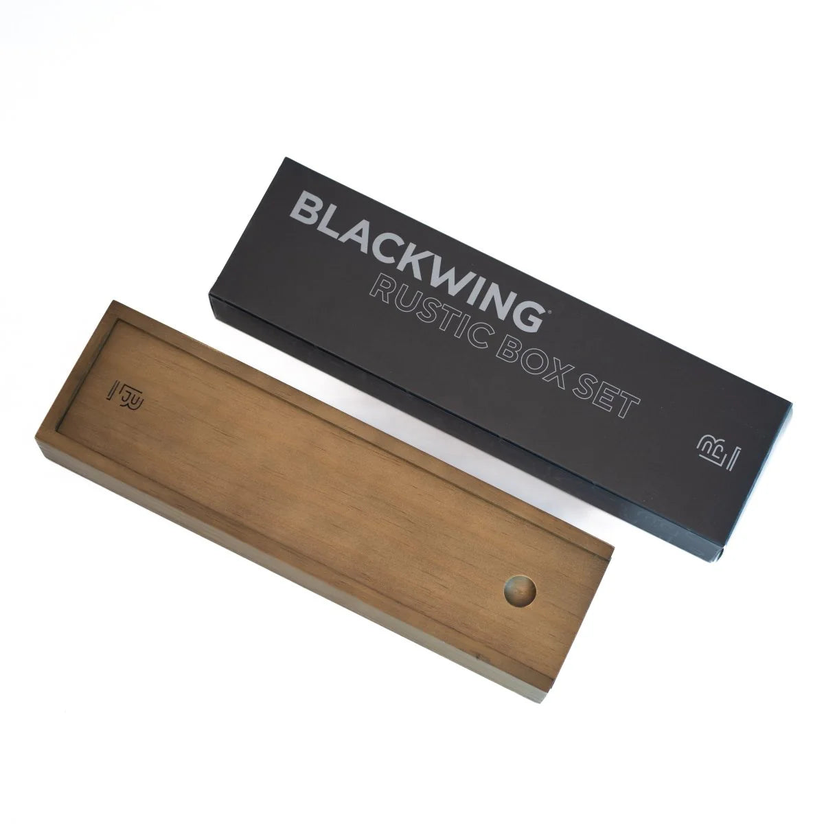 Set of pencils and an eraser in a wooden box on a white background