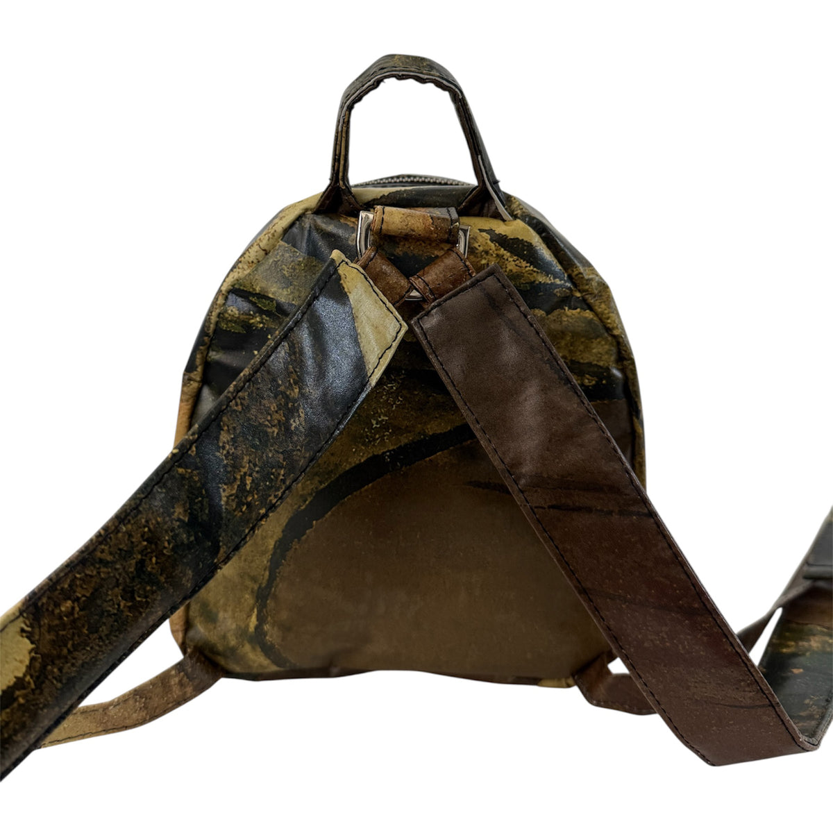 Patterned backpack with a brown strap on a white background