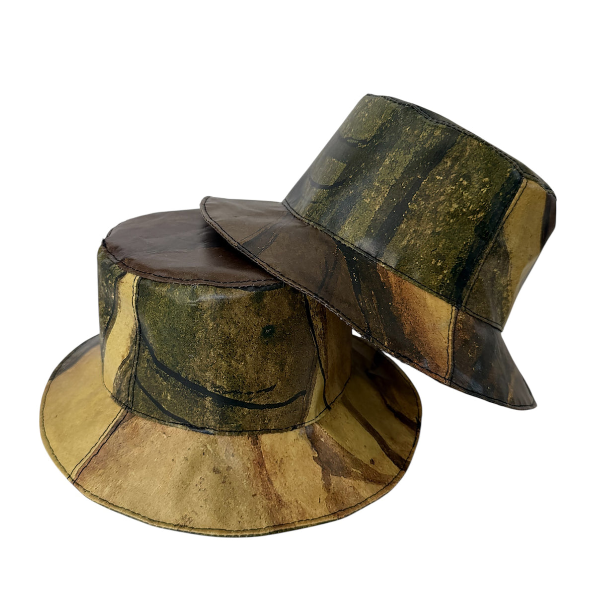 Two bucket hats with a patchwork design on a white background