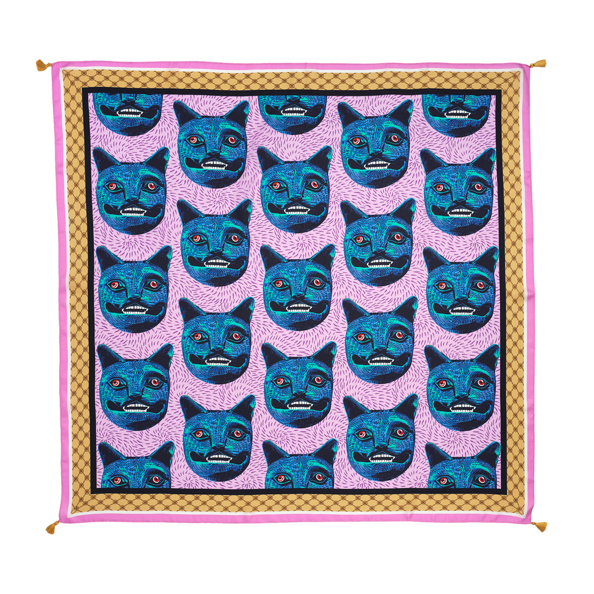 Patterned fabric with blue cat faces on a pink background