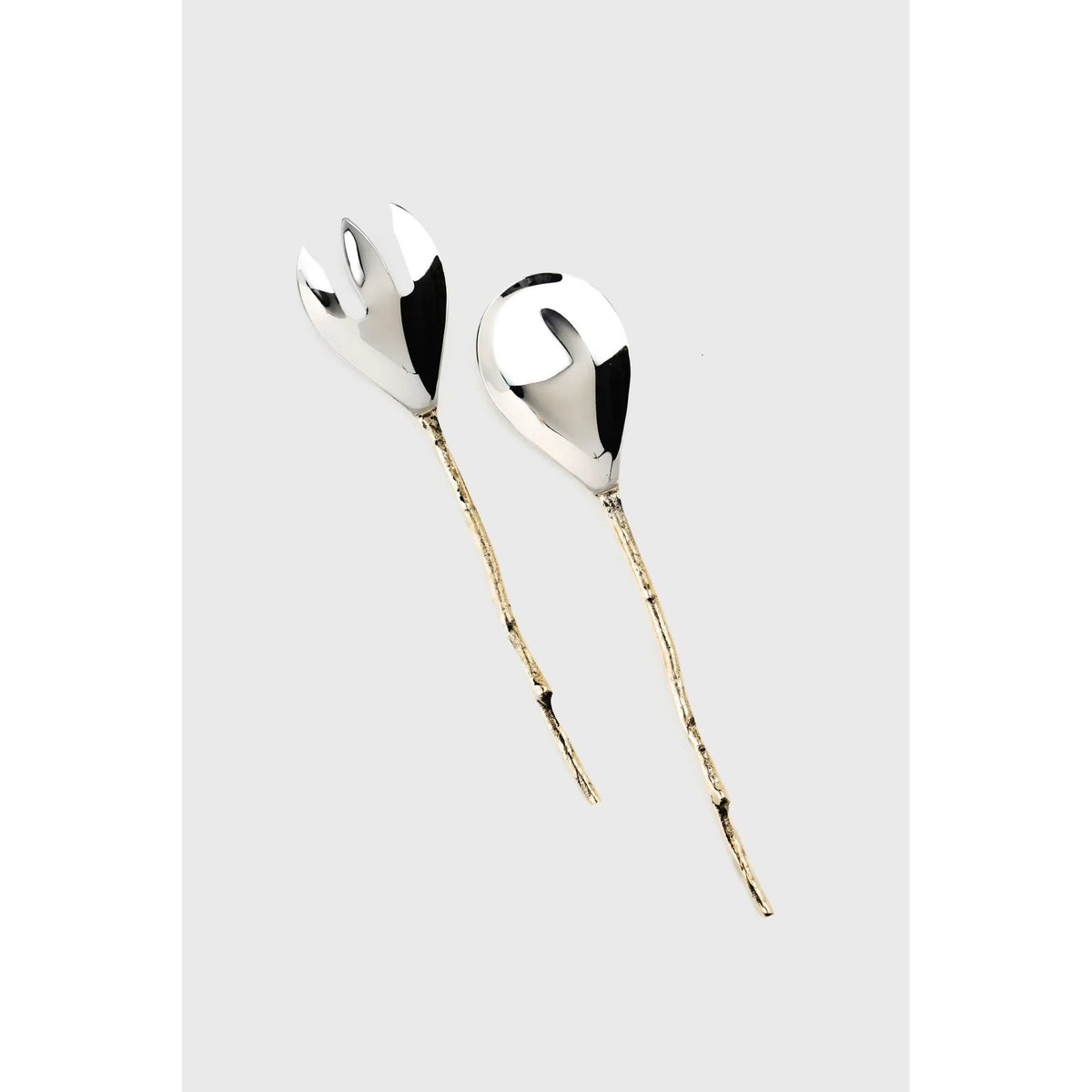 Silver hair accessories with gold accents on a light gray background