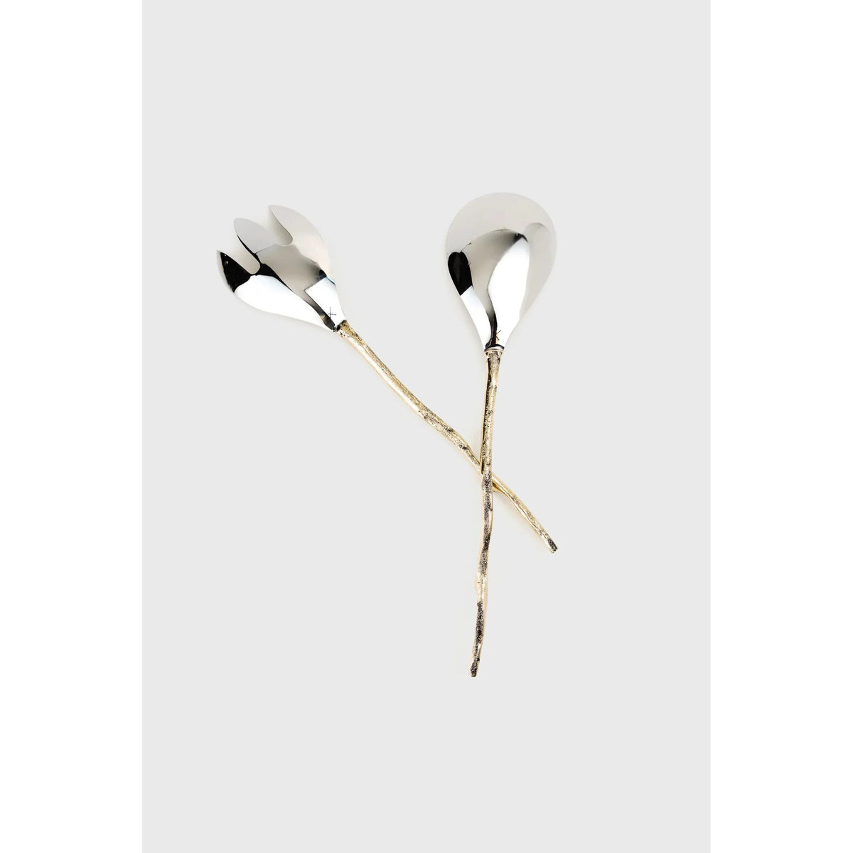 Pair of silver earrings with long gold stems on a light gray background