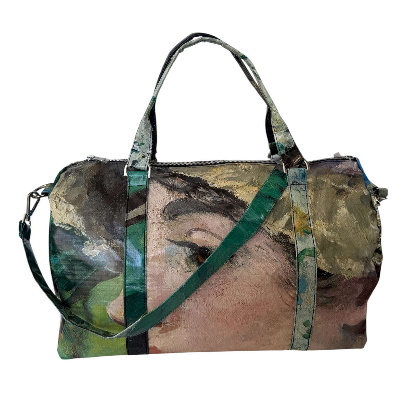 Duffle bag with artistic design of a face on a white background