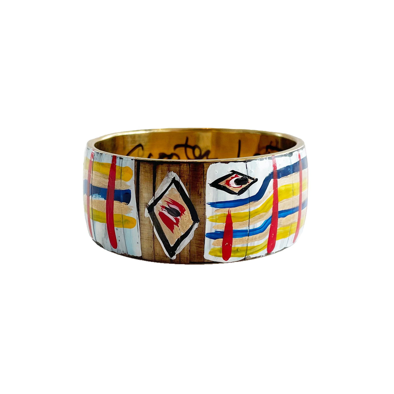 Decorative wooden bowl with abstract patterns on a white background