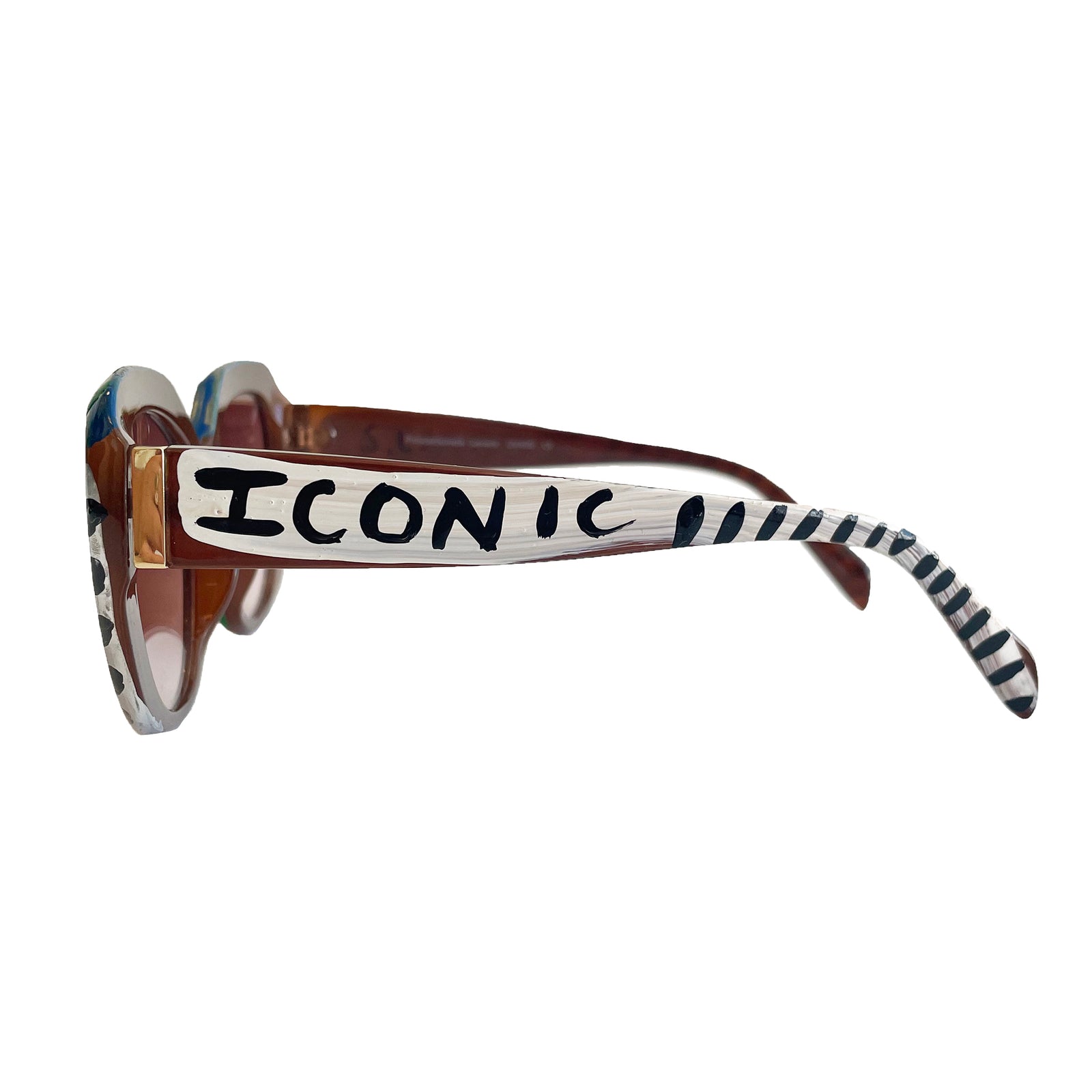 Sunglasses with decorative frame on a white background