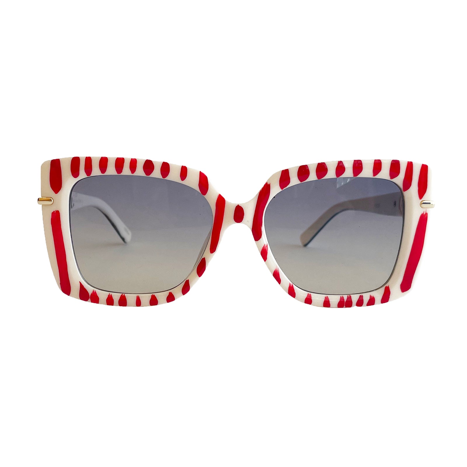 Sunglasses with red and white striped frame on a white background