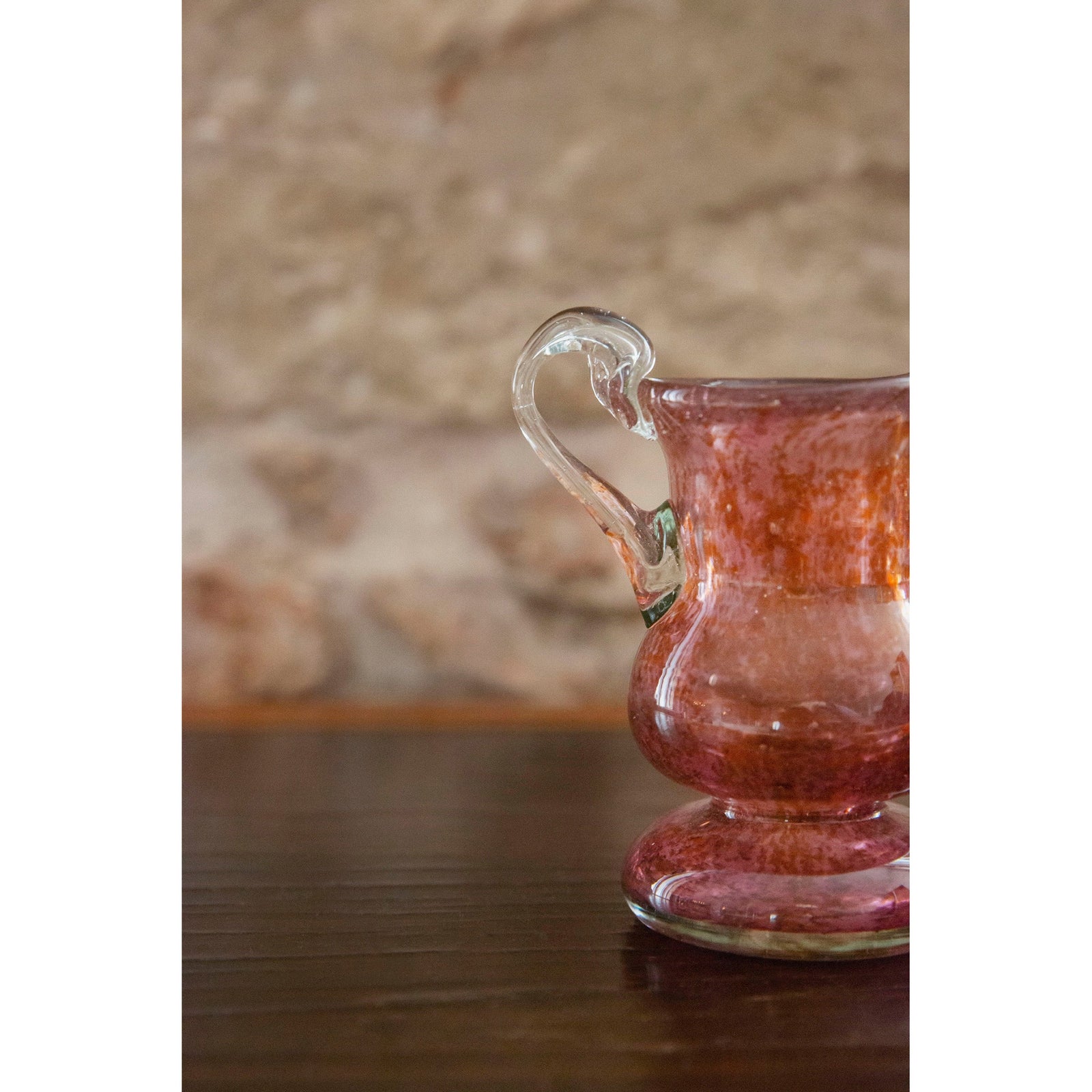 Rose glass vase on white background