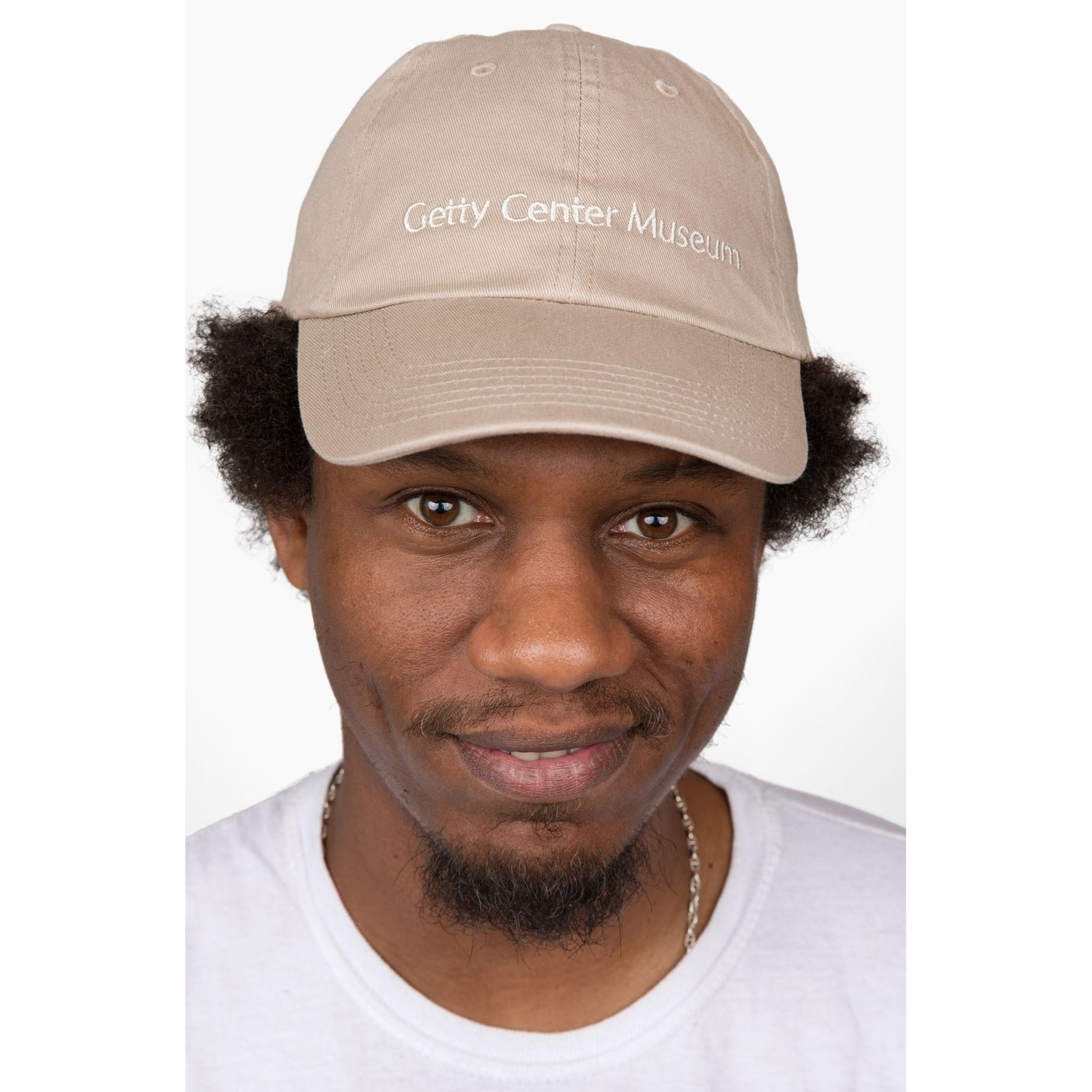 Beige cap with 'Getty Center Museum' text on a white background