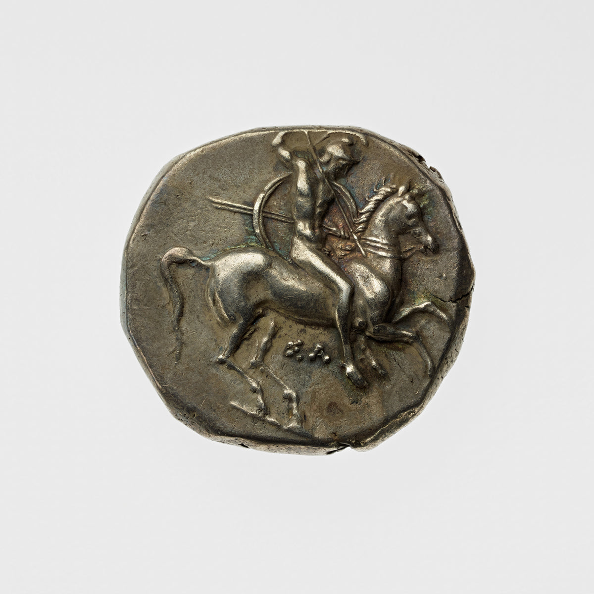 Ancient Coin Depicting a Warrior on Horseback