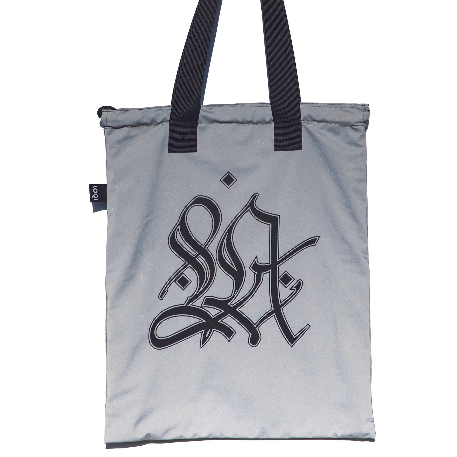 Silver drawstring bag with black text on a white background