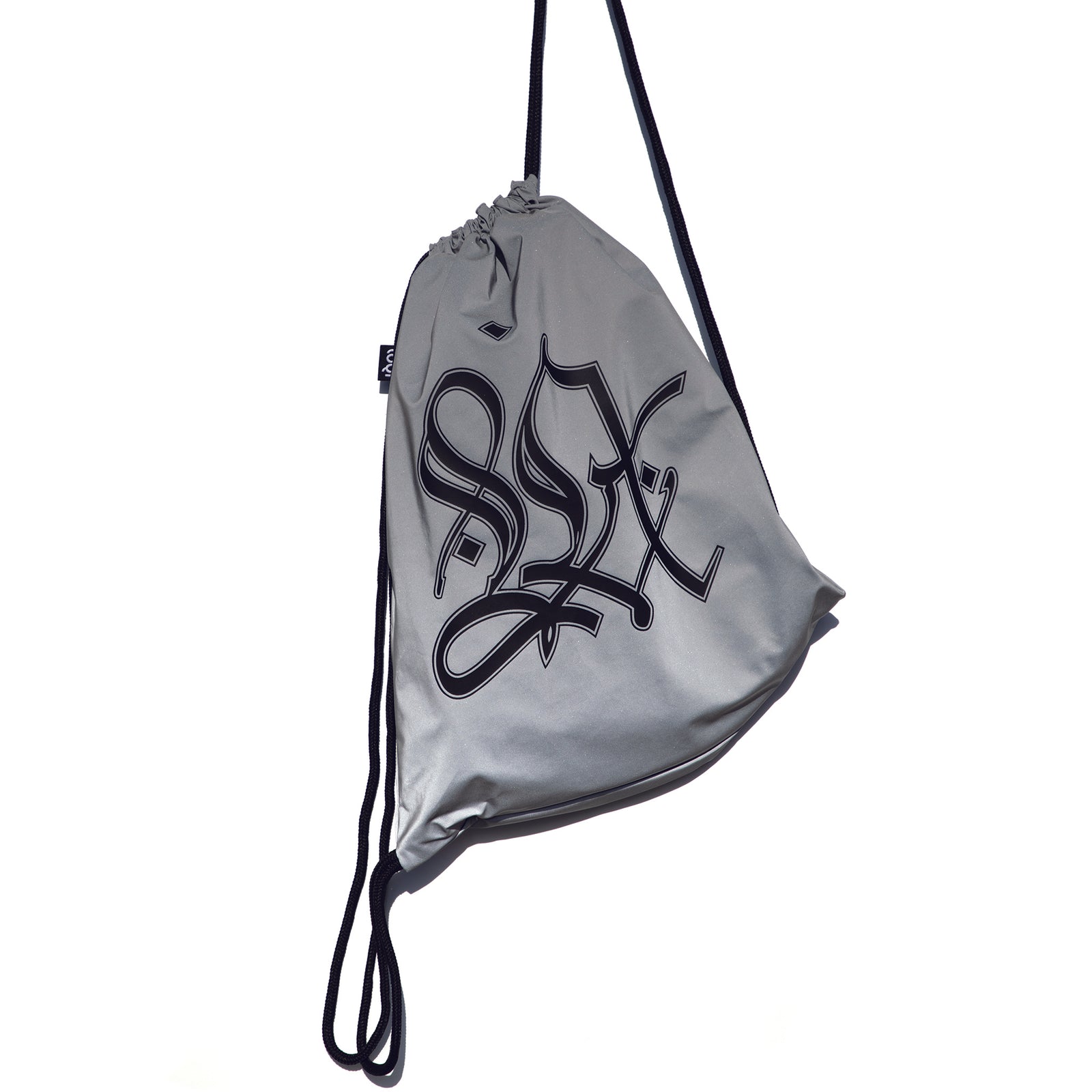 Silver drawstring bag with black text on a white background