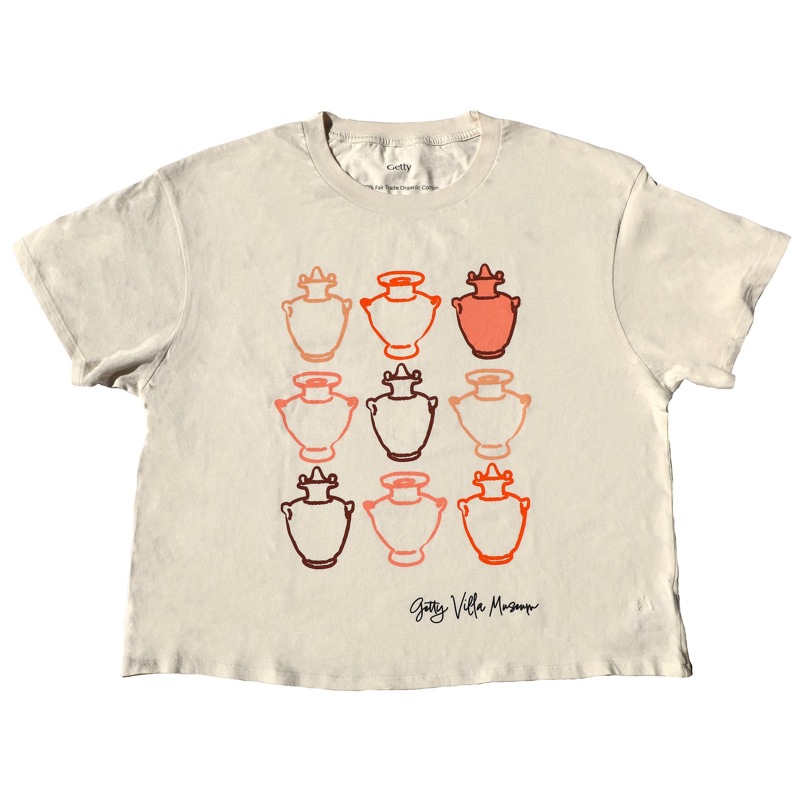 Beige t-shirt with orange and black vase design on a white background