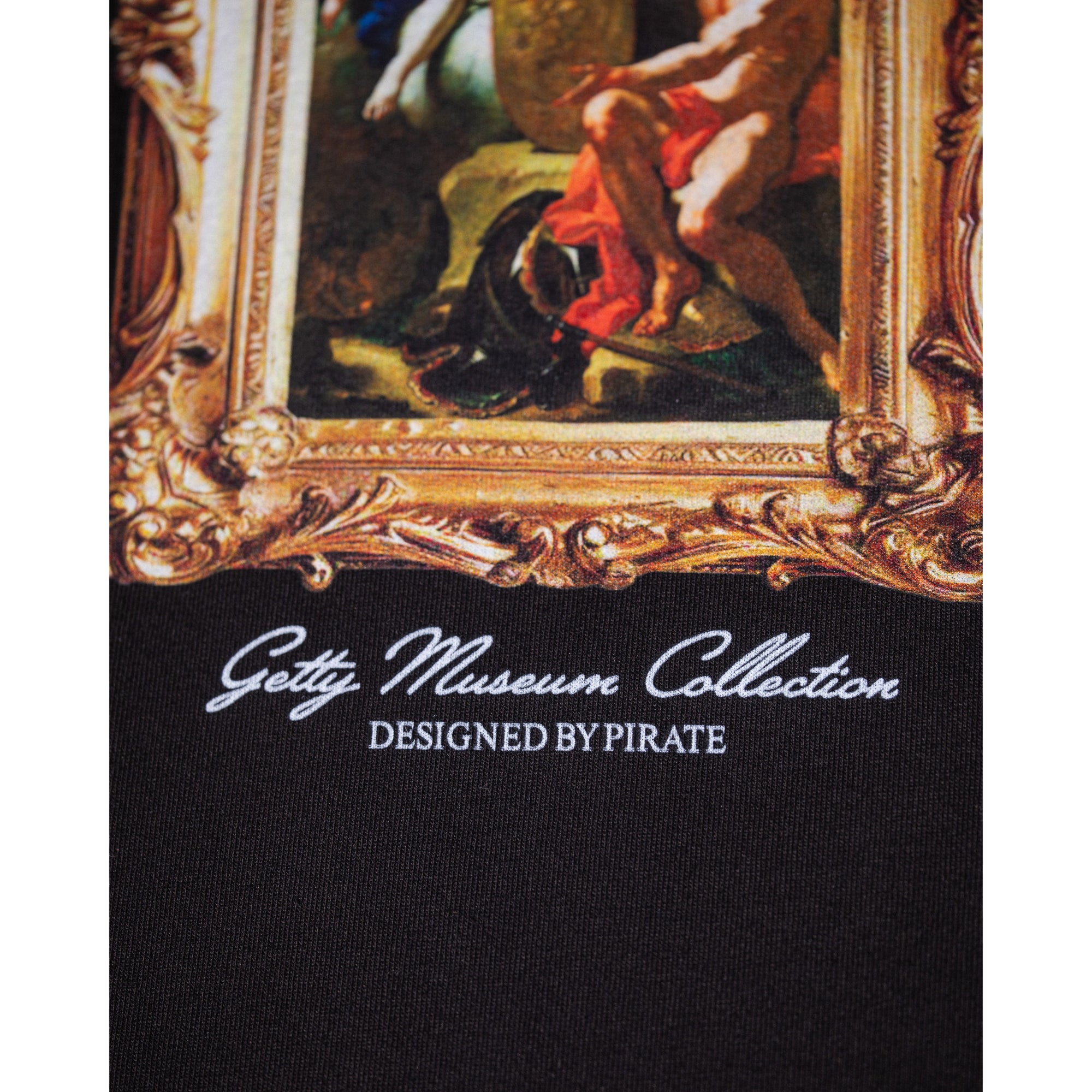 Black t-shirt with a graphic design of a framed painting on a white background