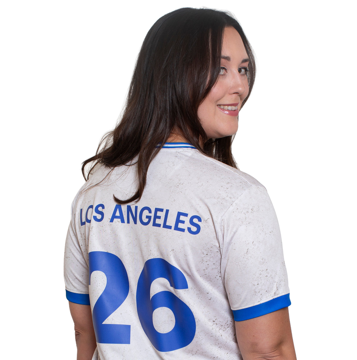 Woman wearing a white sports jersey with 'Los Angeles' and number '26' on a white background
