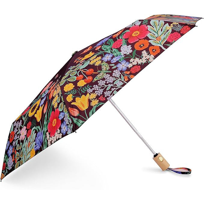 Colorful floral-patterned umbrella on a white background