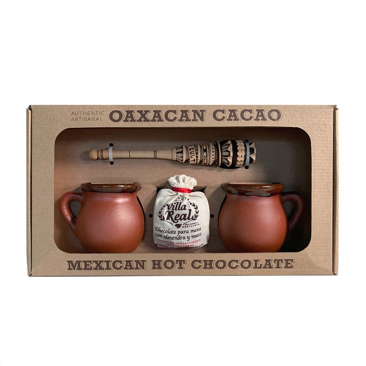Oaxacan hot chocolate gift set in a brown kraft paper box, featuring two terracotta clay pots, a bag of Villa Real's Oaxacan chocolate, and an oaxacan cacao whisk.