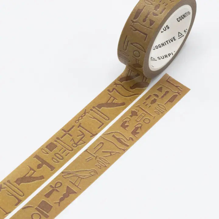 Brown decorative tape with embossed text on a white background