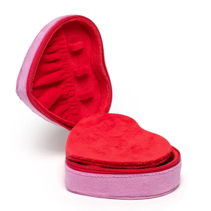 Red makeup brush set in a pink heart-shaped case on a white background
