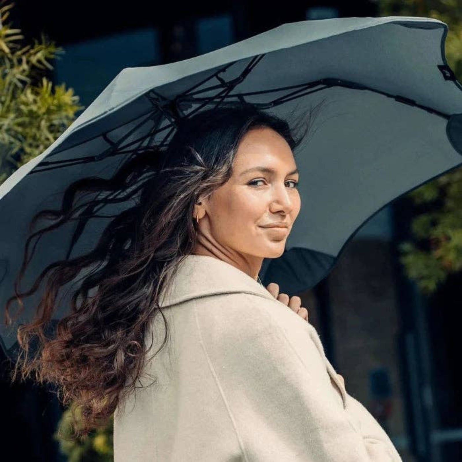 Gray umbrella on a white background