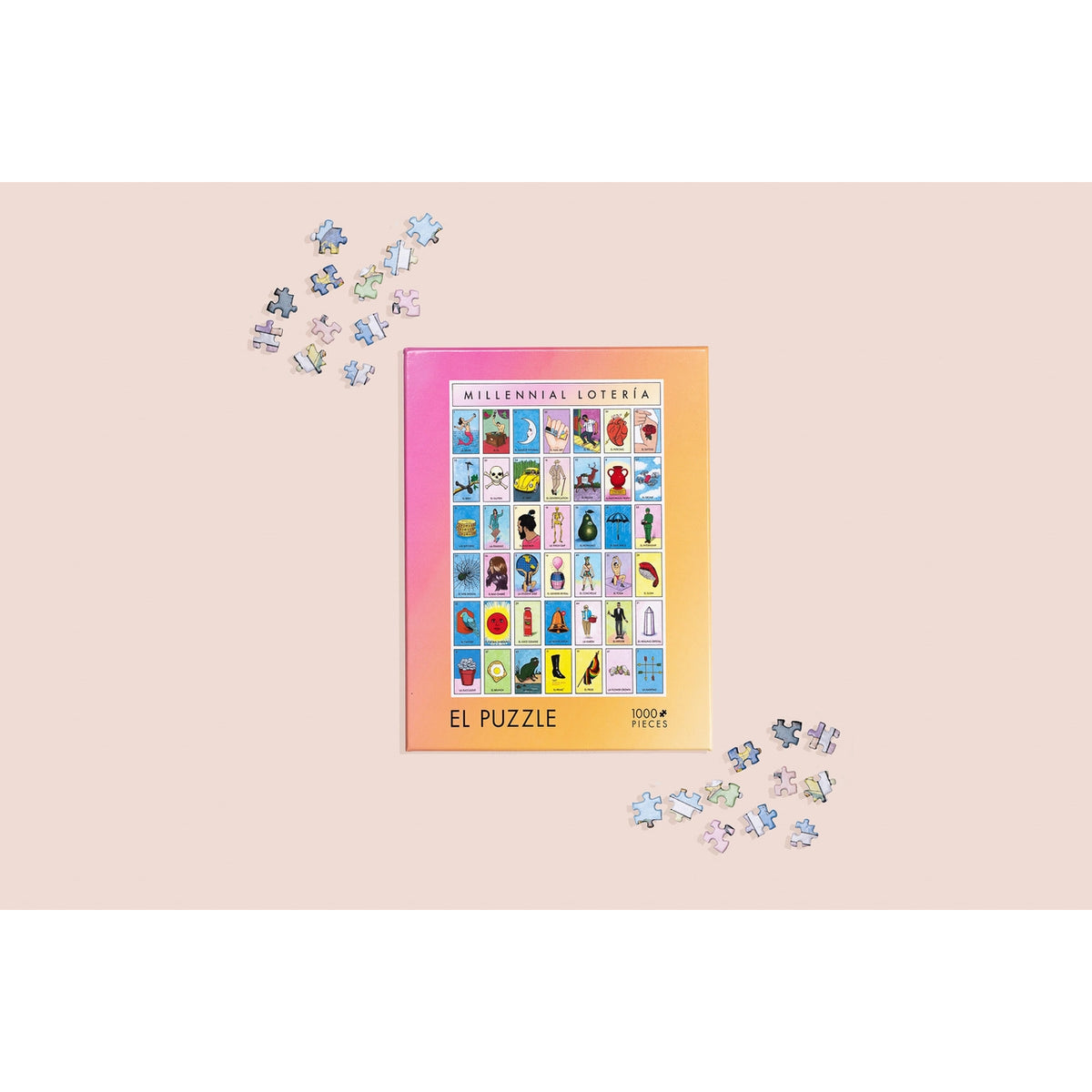 A colorful jigsaw puzzle box labeled 'Millennial Loteria El Puzzle' sits on a pale pink background with several small puzzle pieces scattered around it.
