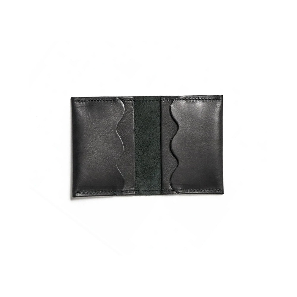 Black leather wallet with 'Dyad' branding on a white background