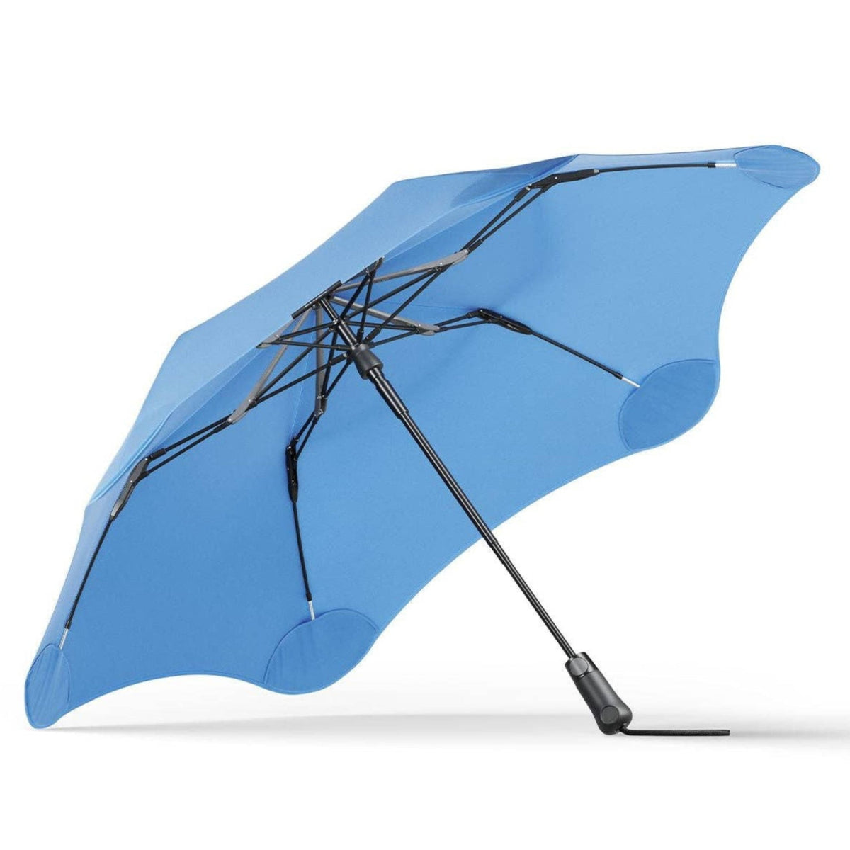 A light blue compact folding umbrella shown open on a clean white background.