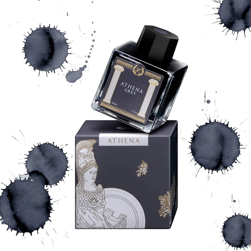 Athena Grey ink bottle and box with ink splashes on a white background