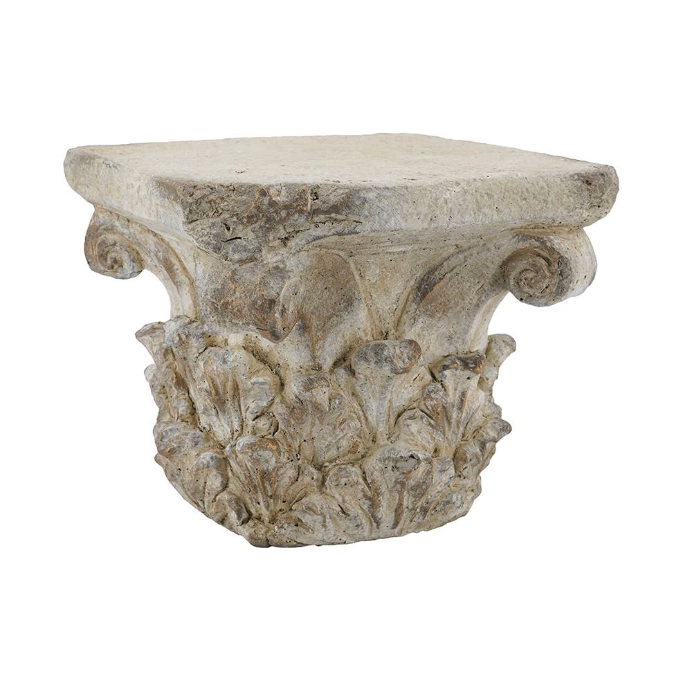 An ornate stone-style side table pedestal featuring a carved acanthus leaf base and a square top, shown against a plain white background.