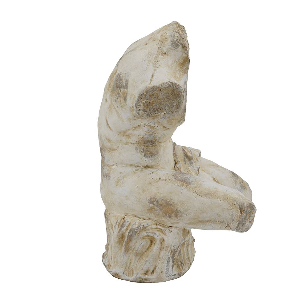 A rustic, weathered stone or concrete figurine of a seated human torso and head, styled with a distressed off-white and beige finish, isolated on a white background.