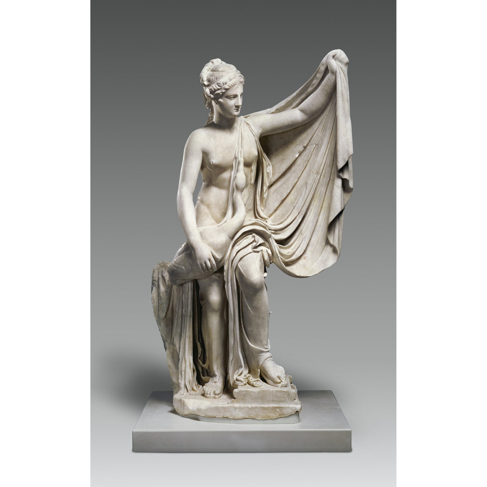 White statue figurine pin