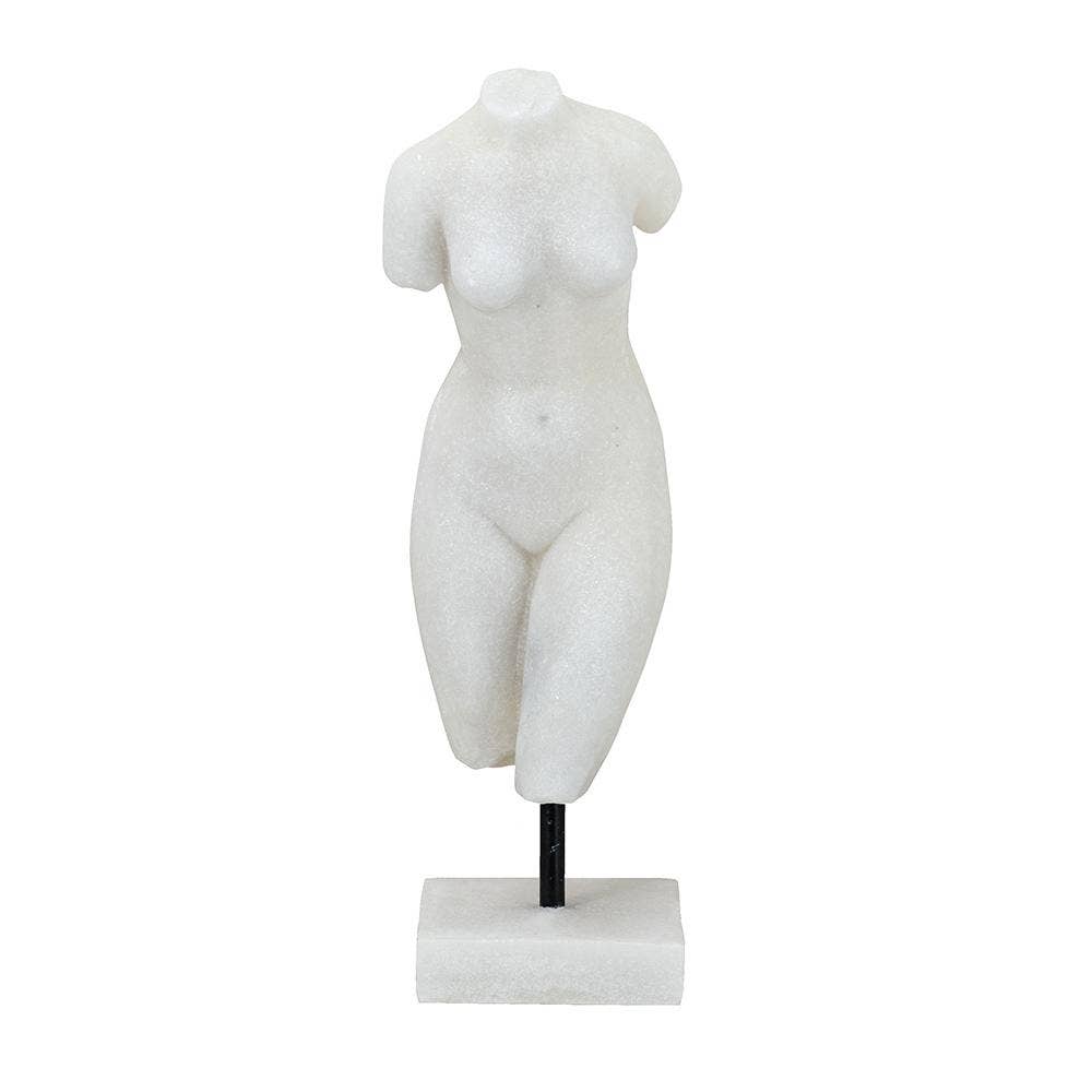 White sculpture of a female nude