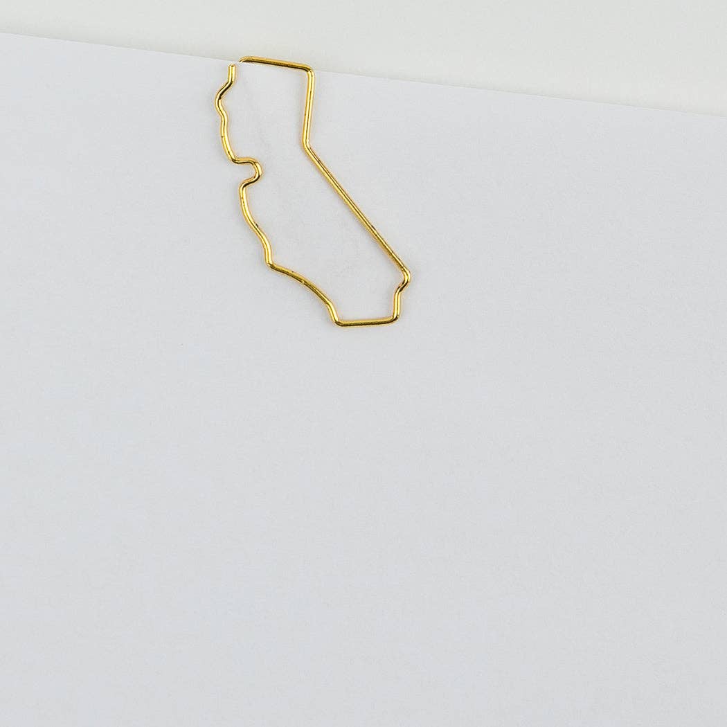 Gold outline of the state of California on a white background