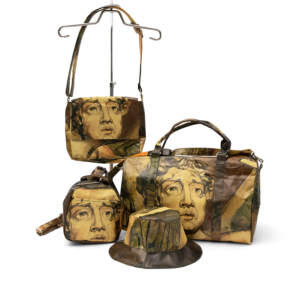 Set of bags with artistic face designs on a white background