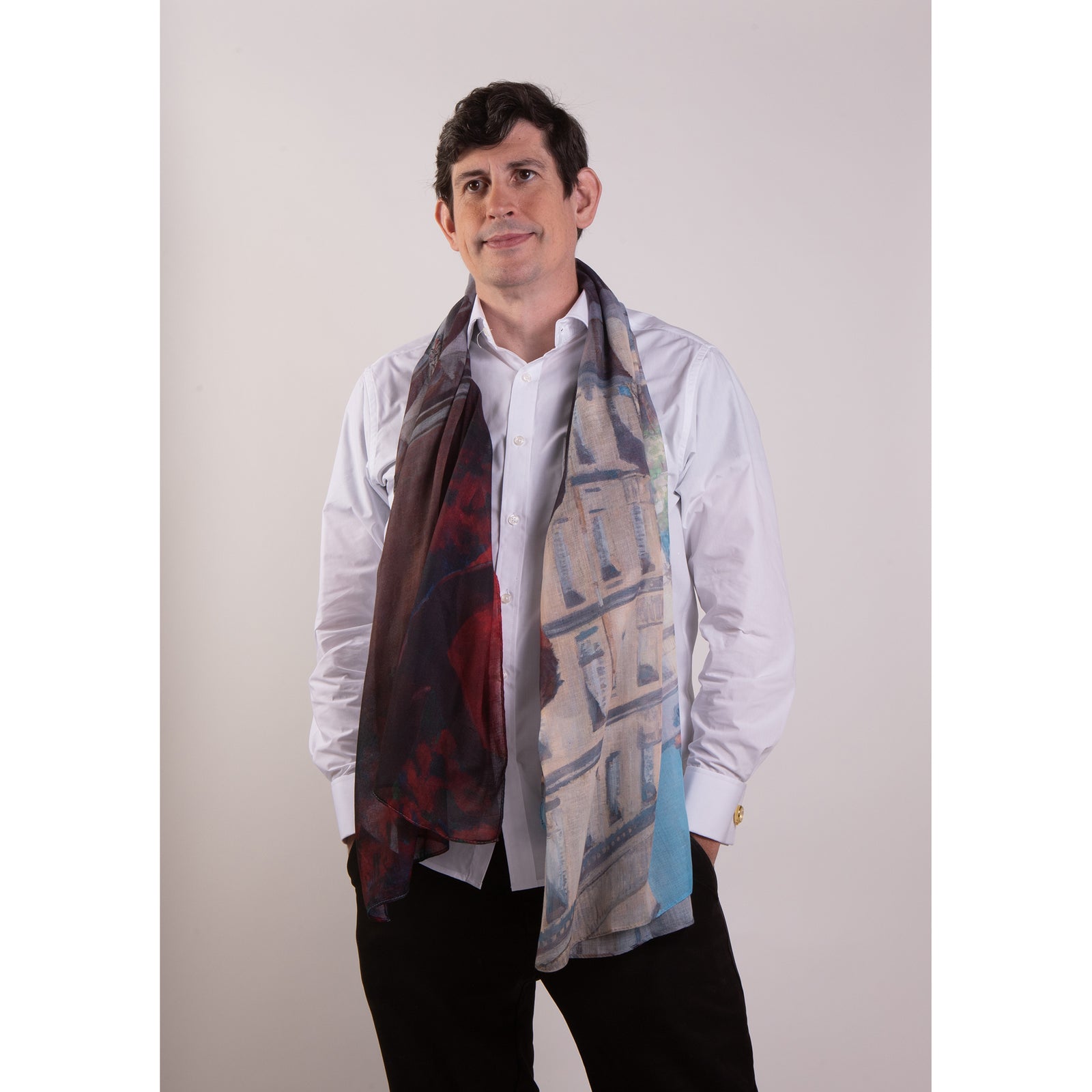 A polyester scarf with a multicolored design inspired by the painting 'Young Man at His Window' by Gustave Caillebotte.