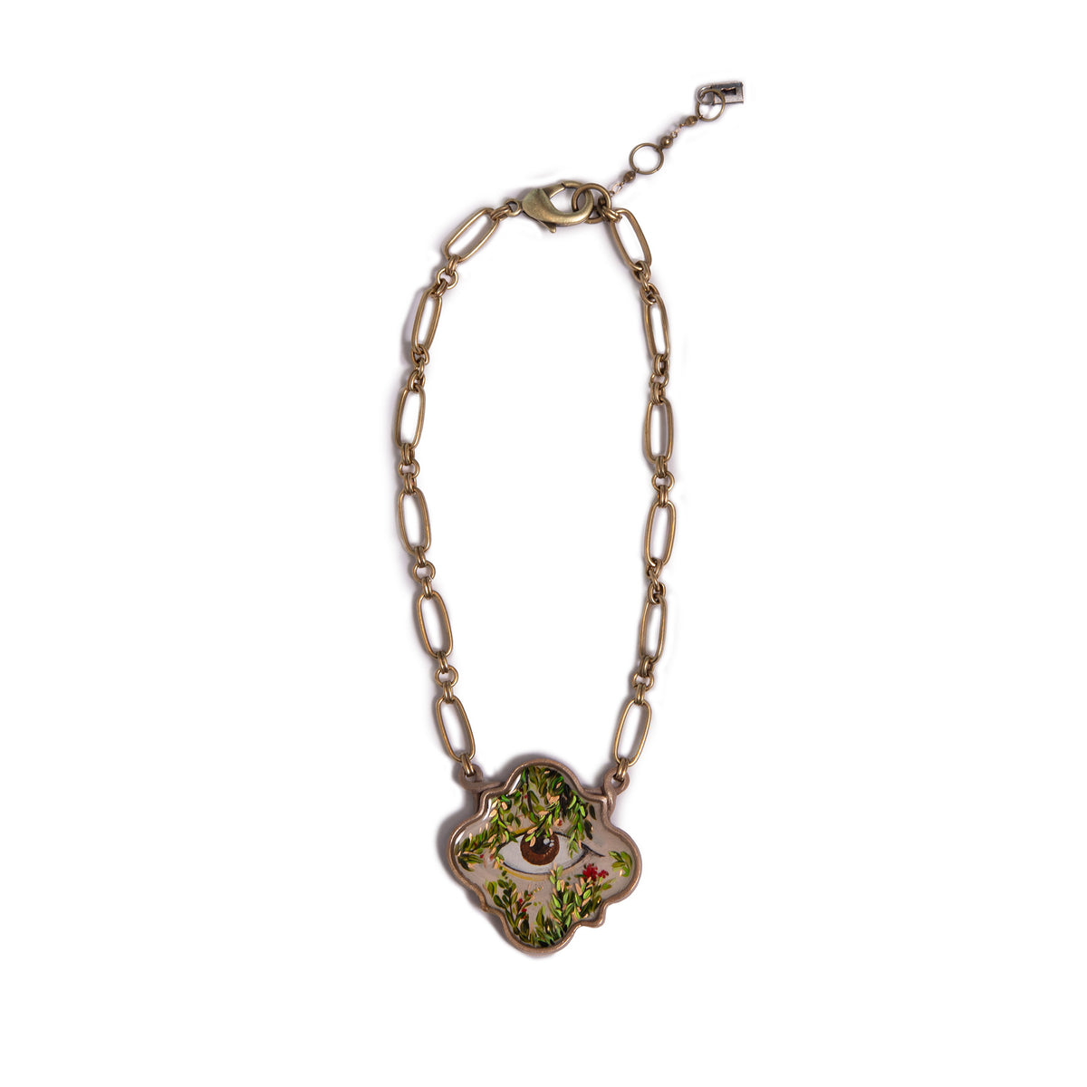Necklace with a floral eye charm on a white background