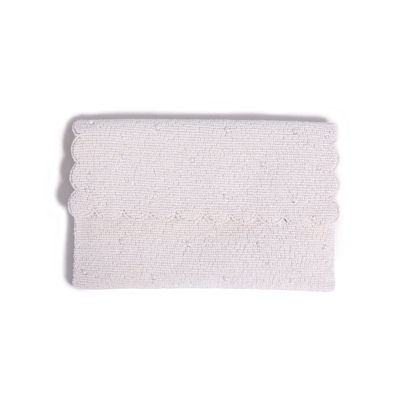 Pearl clutch on white background