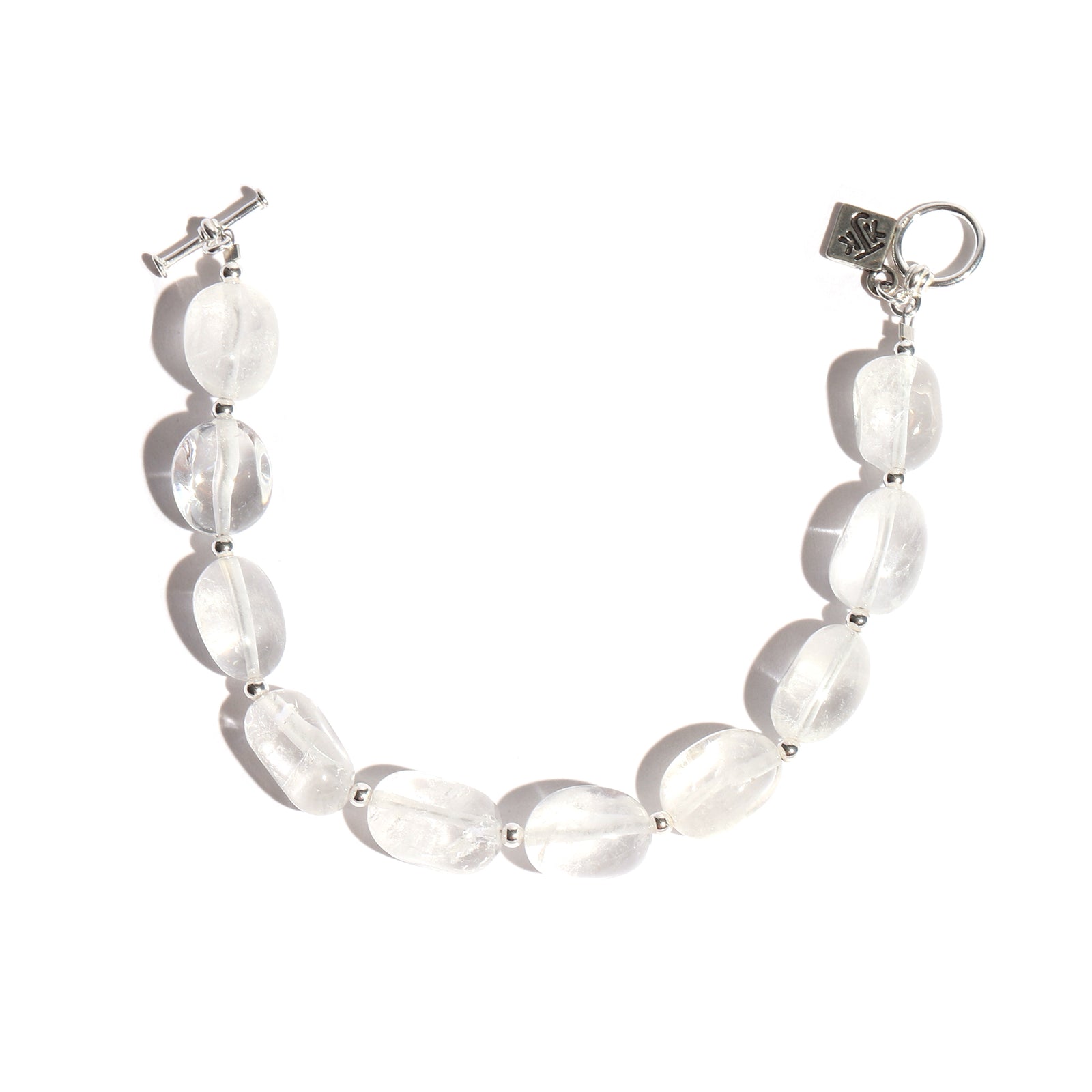 Bracelet with white quartz on a white background