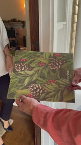 Video of someone being gifted the pop up holiday candle card