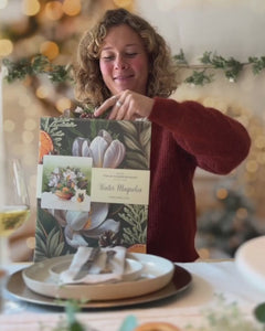 Video of person opening popup winter magnolia card