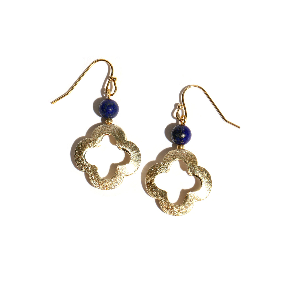 Gold earrings with blue beads on a white background