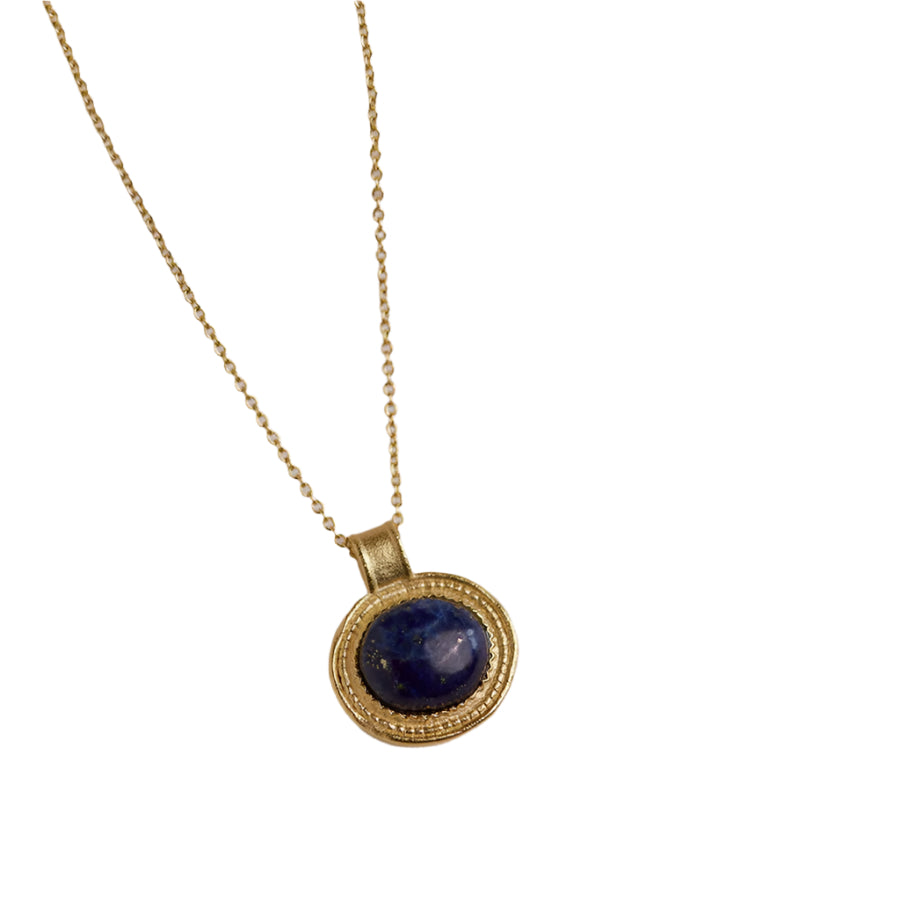 A gold-plated necklace with a round blue lapis lazuli stone set in a gold frame, displayed on a white background.