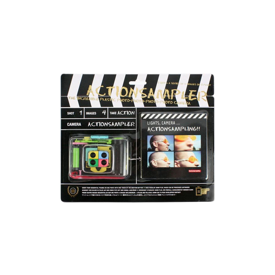 Colorful toy camera with a clear casing on a white background