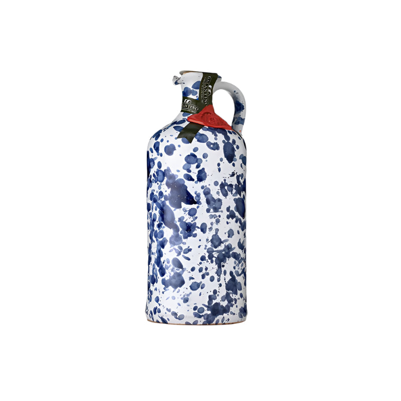 A hand-painted ceramic bottle of extra virgin olive oil with a blue and white speckled design.