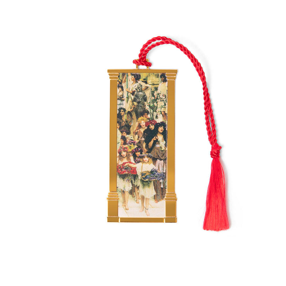 A metal bookmark with a gold finish, featuring a detailed reproduction of Lawrence Alma-Tadema's painting 'Spring', with a red tassel.