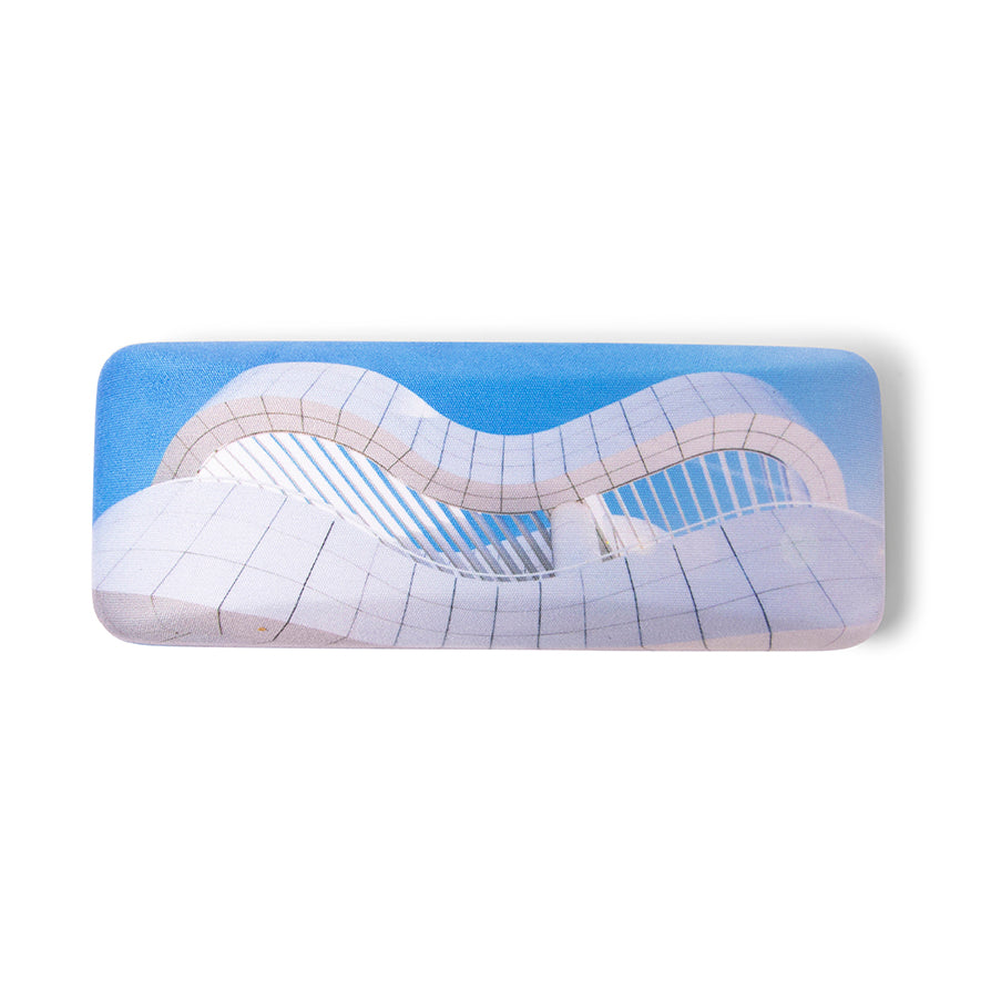 A hard eyeglass case with a microfiber lens cloth, featuring the Getty Center Museum front entrance design.