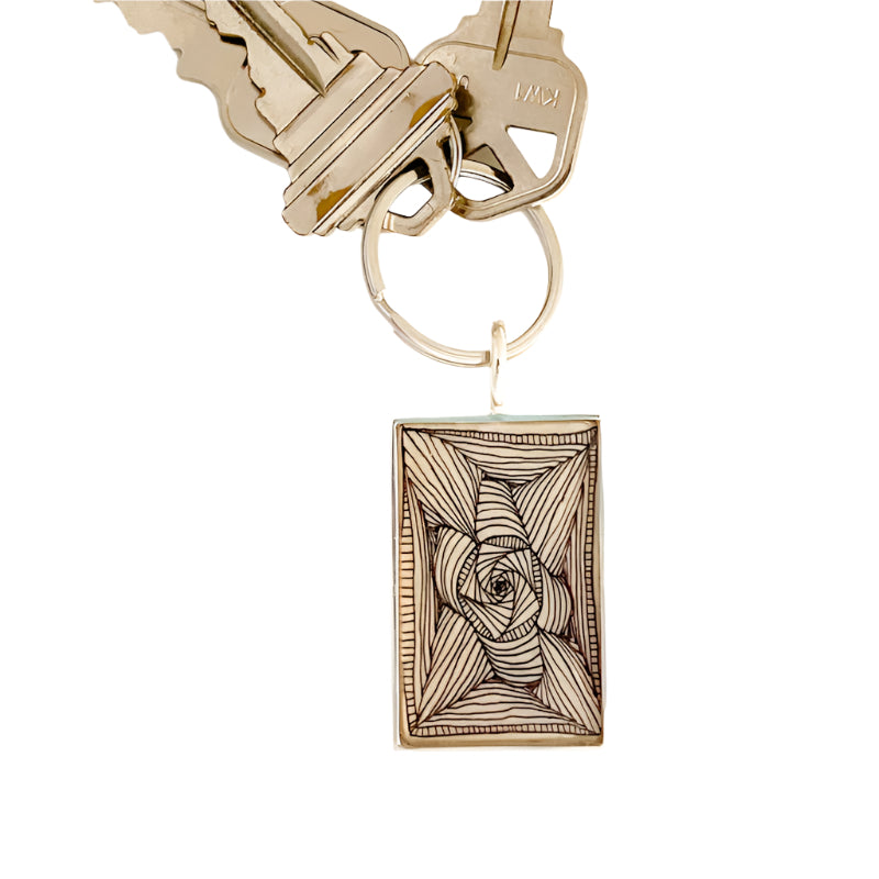 Two keys with hand drawn key chain