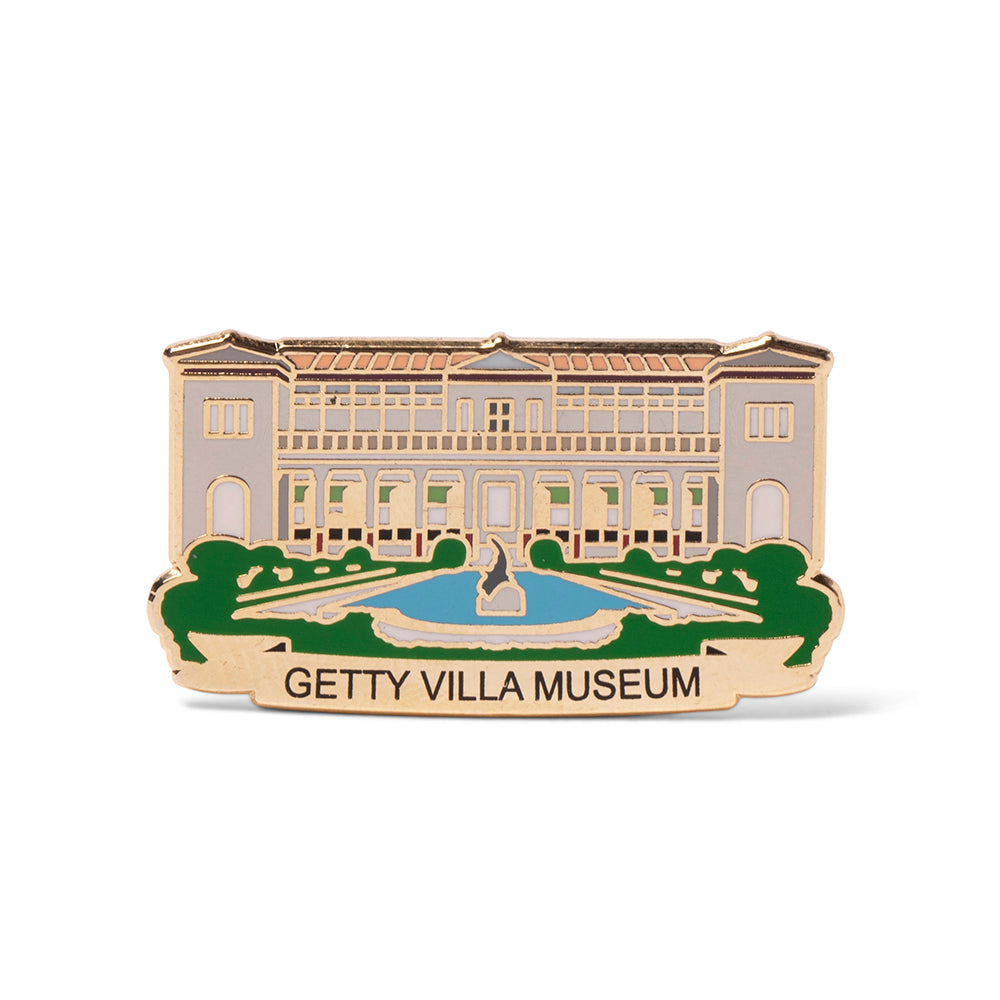 An enamel collector pin with gold tone metal featuring the Getty Villa Museum.