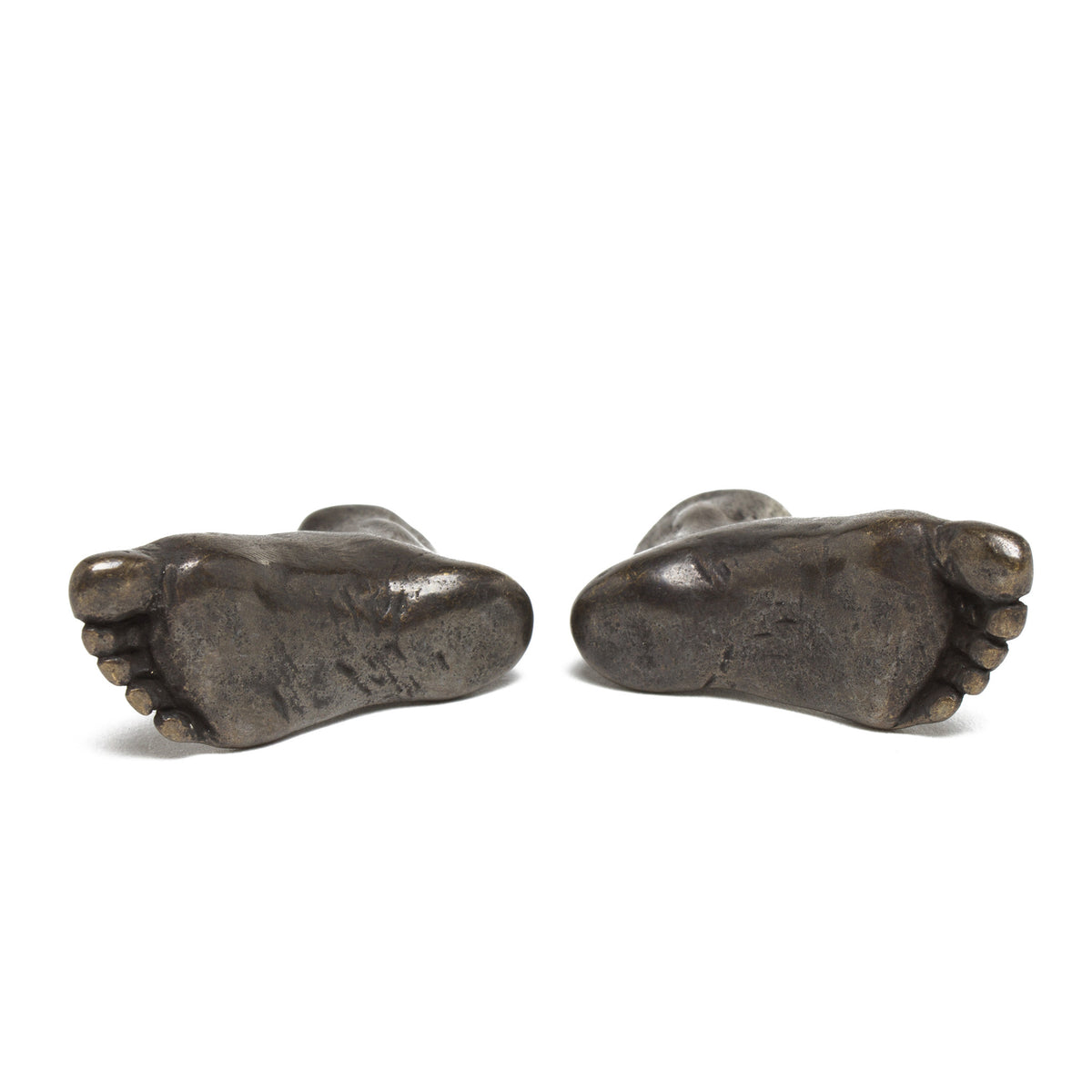 Pair of Miniature cast Bronze Feet- bottom of feet shown | Getty Store